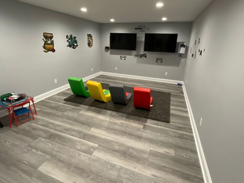 basement with vinyl tiling flooring